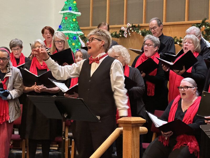 Director Michelle Brown turns to lead the congregation during our annual choir Christmas Concert.